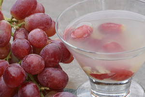 The Grapes & Roses cocktail is sweet, light and aromatic. The drink contains Pisco, grapes, juices and rose water.