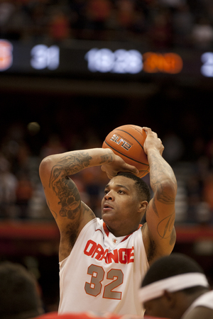 DaJuan Coleman shoots a free throw. The Syracuse forward knocked down all four of his attempts at the line on Monday en route to a team-leading 14-point performance