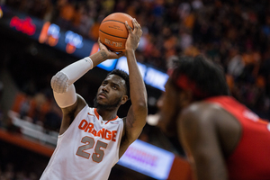 Syracuse forward Rakeem Christmas prepares to release a free throw during the Orange's upset of No. 12 Louisville on Wednesday night.