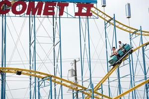 New York State Fair attendees zip through the air at last year's event.