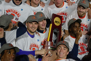 After Syracuse won just five games in Ian McIntyre's first two years as head coach, the Orange are now national champions in his 13th season. It was their first-ever national title game.