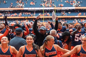 Syracuse first-year head coach Fran Brown celebrates following SU's win over No. 23 Georgia Tech, Brown's first ranked victory since taking over.