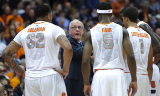 Head coach Jim Boeheim speaks with his team.