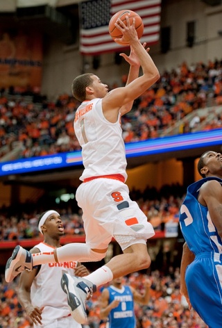 Michael Carter-Williams soars through traffic on a floater attempt.