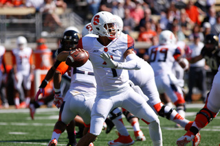 AJ Long looks downfield as he prepares to make a throw. 