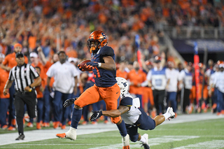 Moe Neal broke a tackle on this 42-yard pass play. 